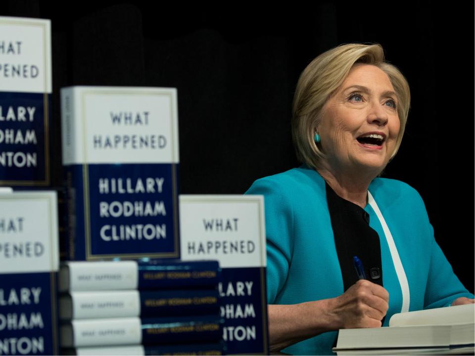 Former US Secretary of State Hillary Clinton signs copies of her new book 'What Happened' during a signing event at Barnes and Noble bookstore in New York City on 12 September 2017: Drew Angerer/Getty Images