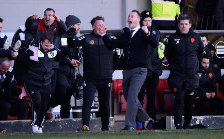 Soccer Football - FA Cup Third Round - Newport County AFC vs Leeds United - Rodney Parade, Newport, Britain - January 7, 2018 Newport County manager Mike Flynn celebrates. REUTERS/Rebecca Naden