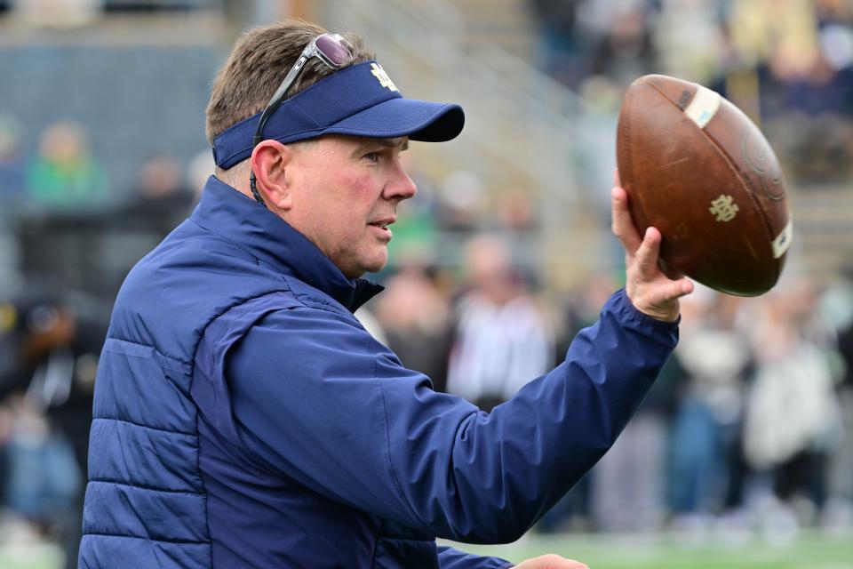 Apr 20, 2024; Notre Dame, IN, USA; Notre Dame Fighting Irish Defensive Coordinator Al Golden participates in warmups before the Blue-Gold Game at Notre Dame Stadium. Mandatory Credit: Matt Cashore-USA TODAY Sports