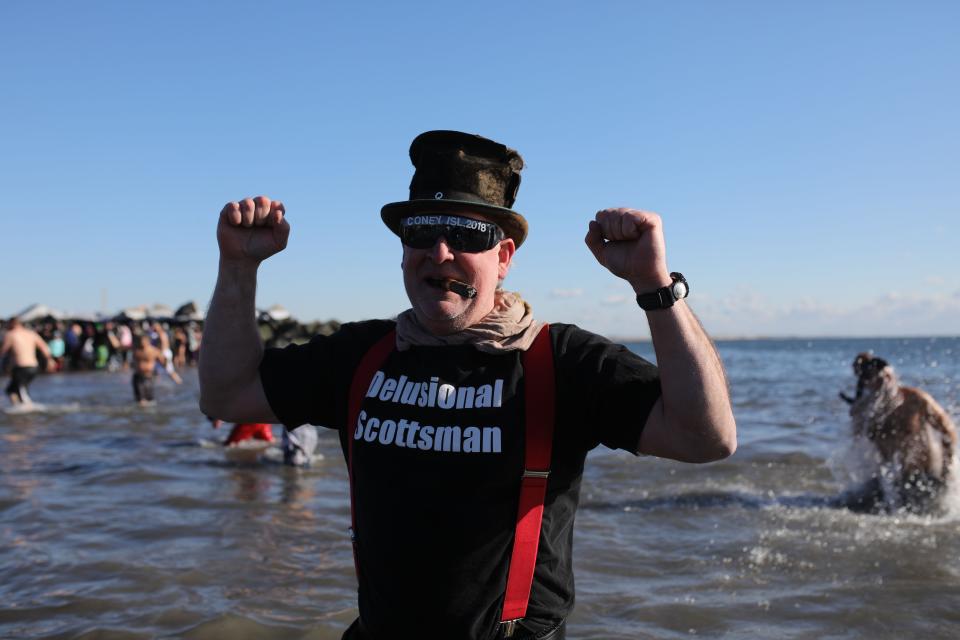 New Yorkers perform polar bear plunge at Coney Island