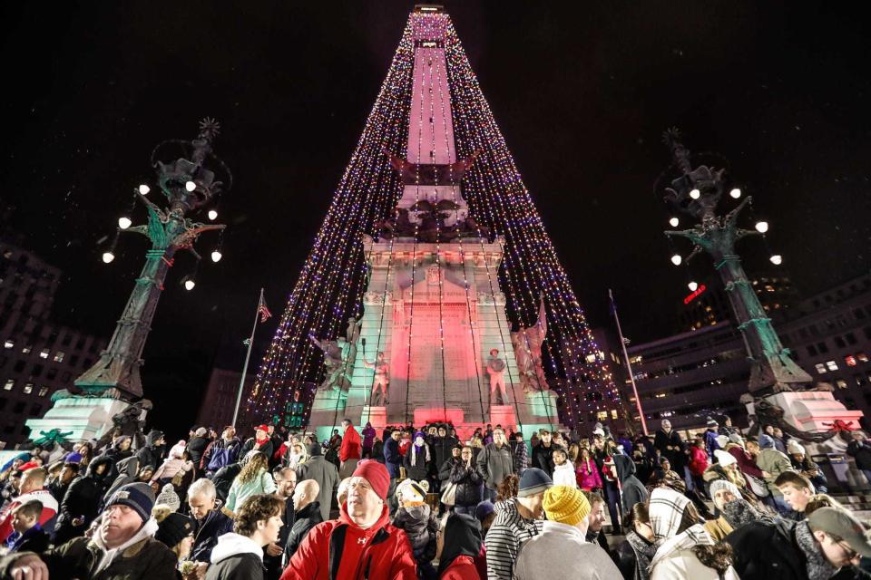 The "world's tallest Christmas tree" is lit during the 2018 Downtown Indy Circle of Lights ceremony, held on Monument Circle in Indianapolis on Nov. 23, 2018.