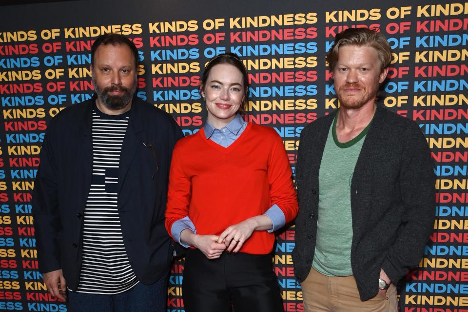 Yorgos Lanthimos, left, Emma Stone and Jesse Plemons screen "Kinds of Kindness" in London on June 24.