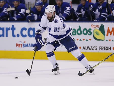 Apr 4, 2019; Toronto, Ontario, CAN; Tampa Bay Lightning forward Nikita Kucherov (86) carries the puck against the Toronto Maple Leafs at Scotiabank Arena. Tampa Bay defeated Toronto. Mandatory Credit: John E. Sokolowski-USA TODAY Sports