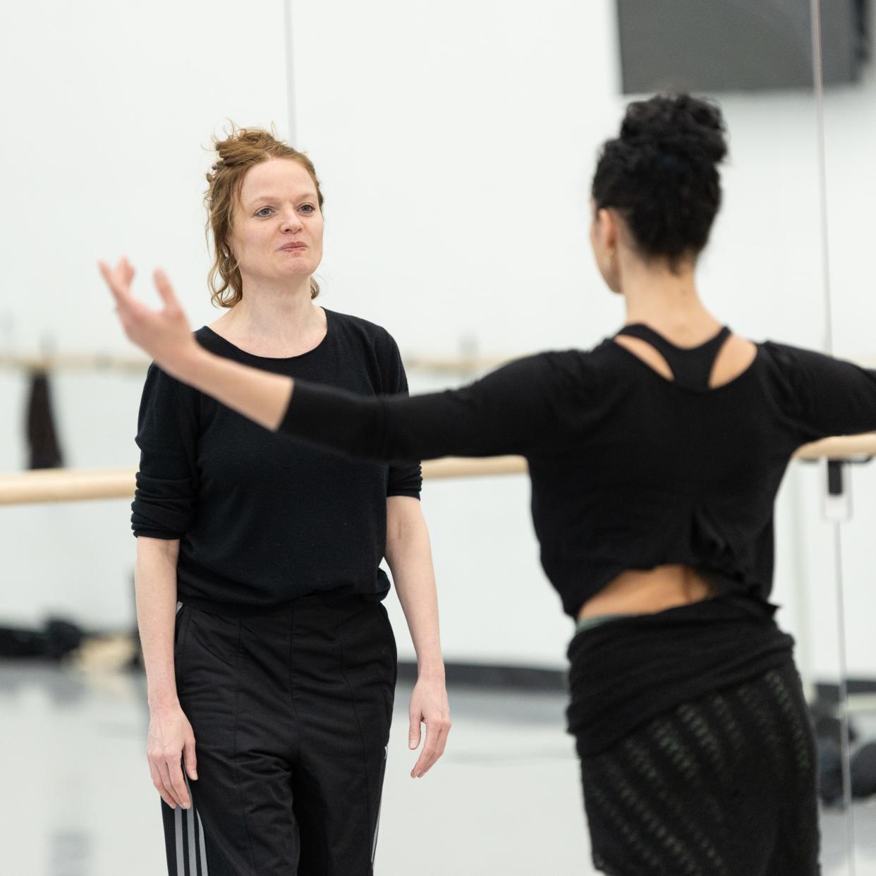 Choreographer Nelly van Bommel, left, works with dancer Marize Fumero in a Milwaukee Ballet rehearsal.