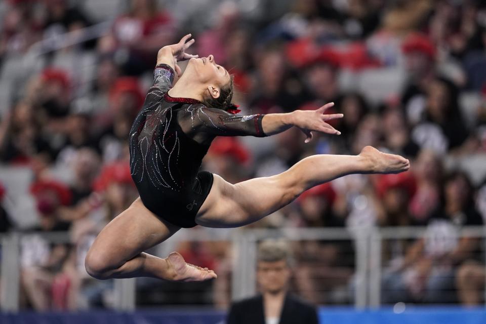 Utah's Grace McCallum competes on the floor exercise during the NCAA women's gymnastics championships, Thursday, April 14, 2022, in Fort Worth, Texas. (AP Photo/Tony Gutierrez)