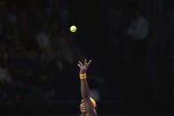 File-This Oct. 22, 2013, file photo shows Serena Williams of the US keeping her eyes the ball as she serves to Angelique Kerber of Germany during their tennis match at the WTA Championship in Istanbul, Turkey. Williams has been voted the AP Female Athlete of the Decade for 2010 to 2019. Williams won 12 of her professional-era record 23 Grand Slam singles titles over the past 10 years. No other woman won more than three in that span. She also tied a record for most consecutive weeks ranked No. 1 and collected a tour-leading 37 titles in all during the decade. Gymnast Simone Biles finished second in the vote by AP member sports editors and AP beat writers. Swimmer Katie Ledecky was third, followed by ski racers Lindsey Vonn and Mikaela Shiffrin.(AP Photo/File)