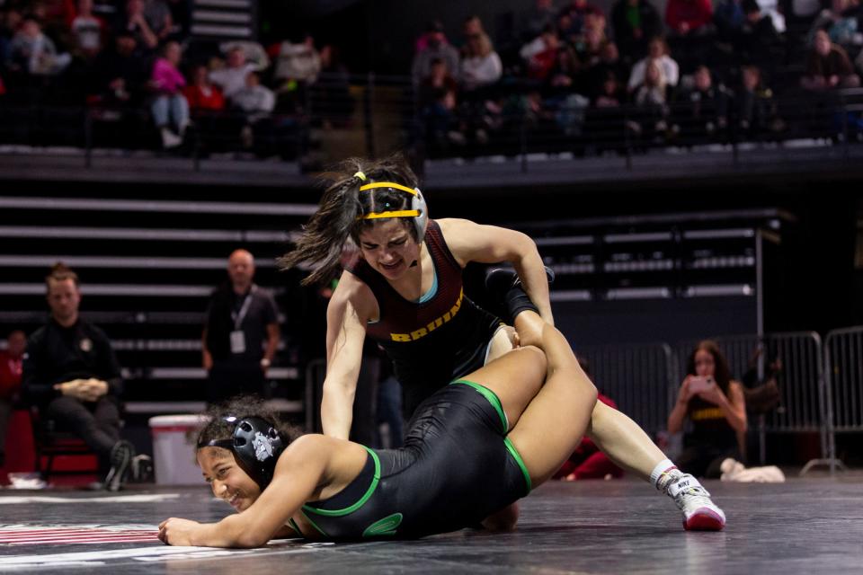 Provo’s Ella Reynolds and Mountain View’s Isla Baez compete in the 4A Girls Wrestling State Championships at the UCCU Center in Orem on Thursday, Feb. 15, 2024. | Marielle Scott, Deseret News