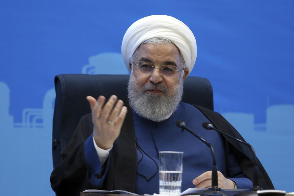 In this photo released by the official website of the office of the Iranian Presidency, President Hassan Rouhani speaks in a meeting during his provincial tour to the North Khorasan, Iran, Sunday, July 14, 2019. Rouhani said his country is ready to negotiate with the United States if Washington lifts its economic sanctions. (Iranian Presidency Office via AP)