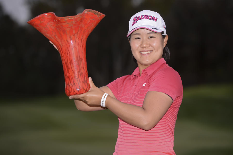 Nasa Hataoka, of Japan, poses with the winner trophy after winning the Kia Classic LPGA golf tournament, Sunday, March 31, 2019, in Carlsbad, Calif. (AP Photo/Orlando Ramirez)