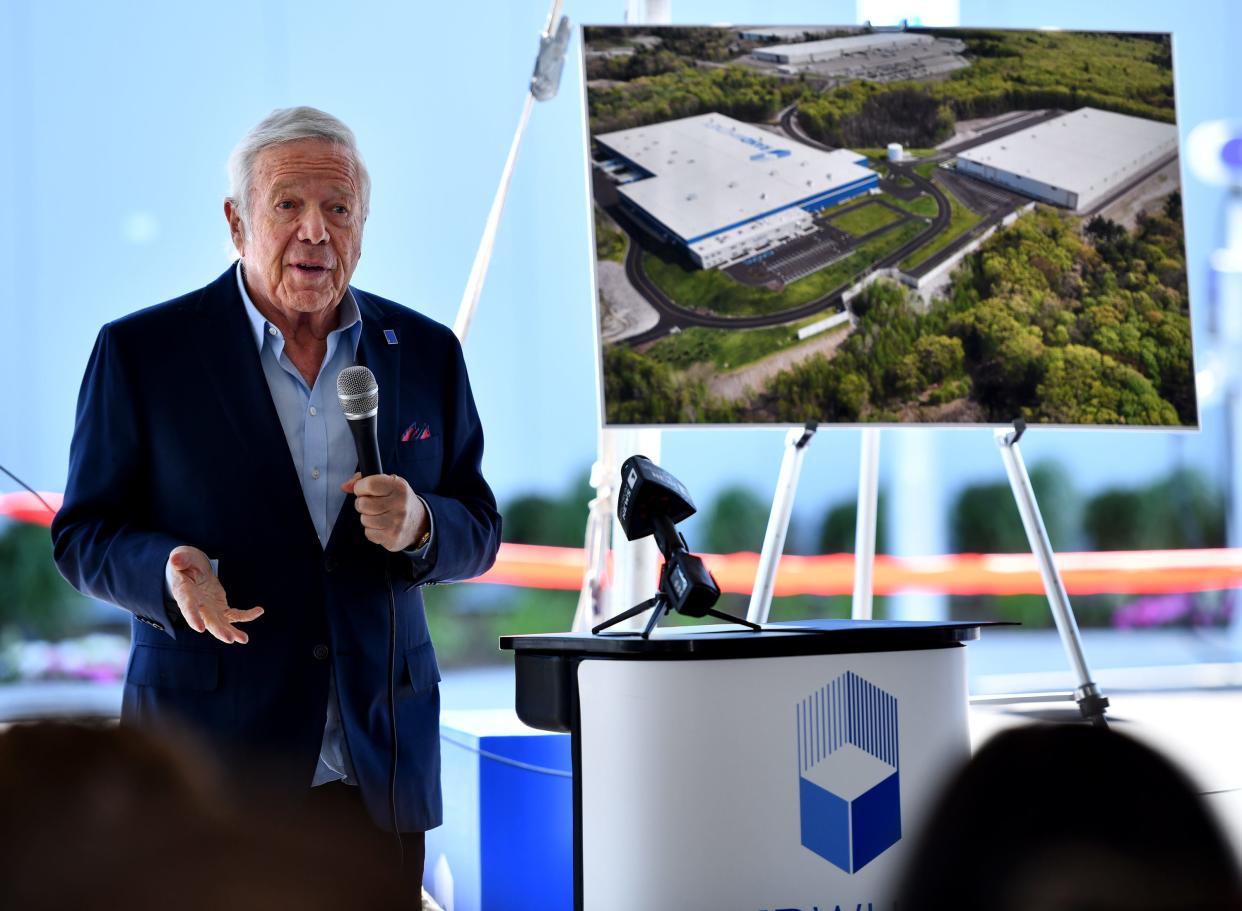 Owner Robert Kraft speaks during the ribbon-cutting ceremony for a 384,000 square-foot warehouse in Boylston.