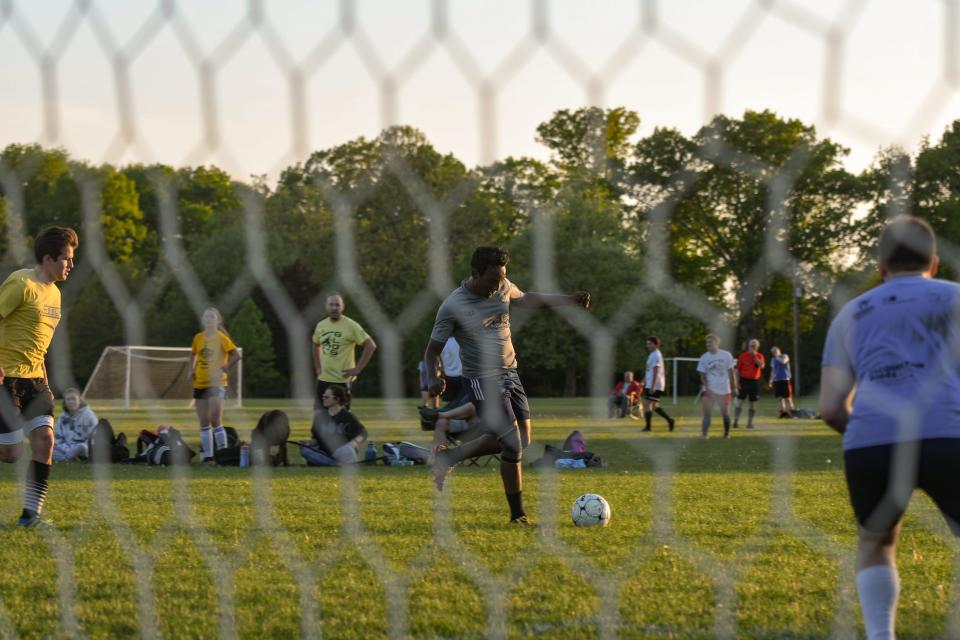 "It's really my passion. I invested my life savings to buy these (soccer) goals to help create this," Greater Lansing Open Soccer organizer Dean Jong, 35, of Lansing says Tuesday, May 24, 2022, pictured near the soccer fields at Frances Park in Lansing. The East Lansing native started the co-ed soccer league in 2019. The league has grown to  25 teams with about 260 players