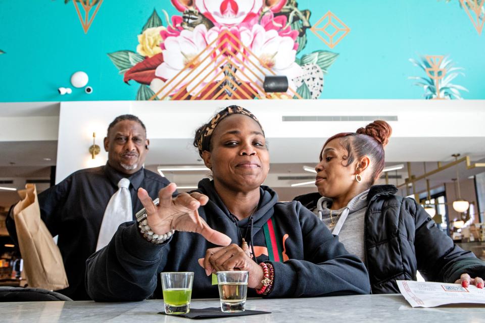 Sherry Jackson, at center, enjoys happy hour cocktails with friends at Deco Bar inside DE.CO, a food hall located in the Dupont Building, in downtown Wilmington, Thursday, March 16, 2023.