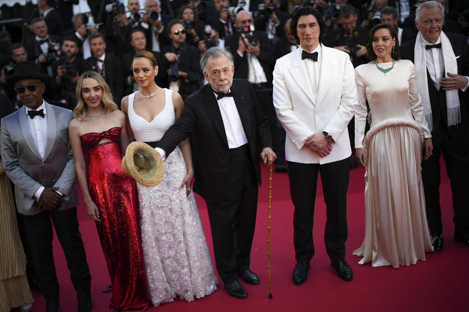 Giancarlo Esposito, from left, Chloe Fineman, Nathalie Emmanuel, director Francis Ford Coppola, Adam Driver, Aubrey Plaza, and Jon Voight pose for photographers upon arrival at the premiere of the film 'Megalopolis' at the 77th international film festival, Cannes, southern France, Thursday, May 16, 2024. (Photo by Daniel Cole/Invision/AP)