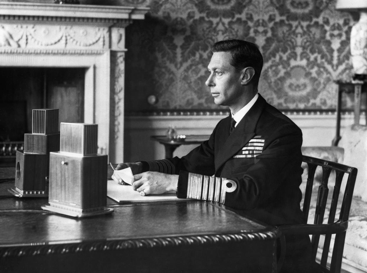 King George VI addresses the British people over radio on September 4, 1939, one day after Britain declared war on Nazi Germany. He asked them to "stand calm, firm, and united" against what was to come. (Photo by © Hulton-Deutsch Collection/CORBIS/Corbis via Getty Images)