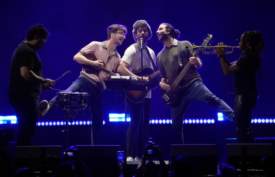 Ryan Met, second from left, Jack Met, center, and Adam Met, second from right, of AJR perform at the 2023 iHeartRadio Jingle Ball at the Kia Forum, Friday, Dec. 1, 2023, in Inglewood, Calif.