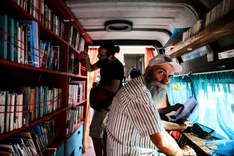 Inside the library van in Athens are books in English, Greek, Arabic, French, Kurdish and Farsi -- Agatha Christie is a favourite