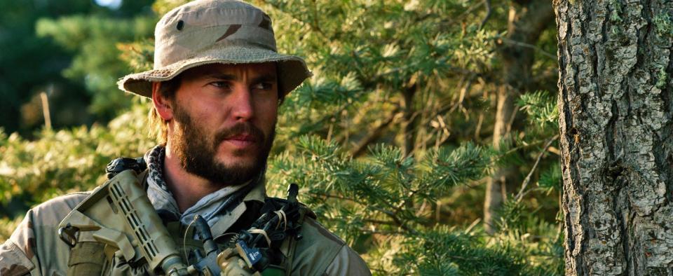 This photo released by Universal Pictures shows Taylor Kitsch as Michael Murphy in a scene from the film, “Lone Survivor." (AP Photo/Universal Pictures)