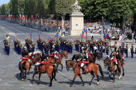 <p>Members of the Republican Guard ride horses during the traditional Bastille Day military parade on the Champs-Élysées in Paris, France, July 14, 2018. (Photo: Gonzalo Fuentes/Reuters) </p>
