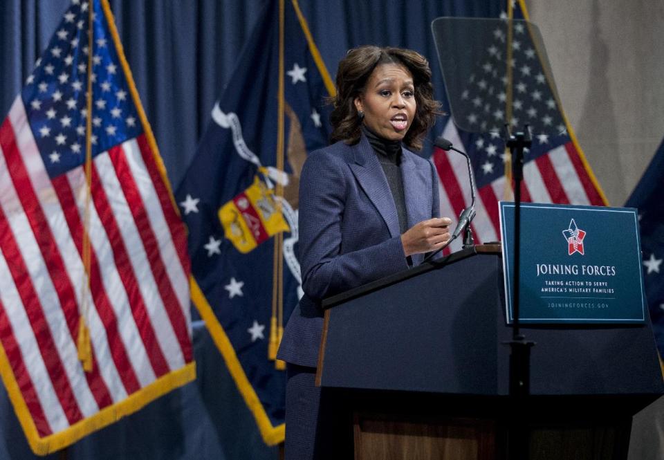 First lady Michelle Obama speaks at a National Symposium on Veterans’ Employment in Construction, hosted by the Labor Department, Monday, Feb. 10, 2014, in Washington. Mrs. Obama said a construction industry pledge to hire 100,000 veterans by 2019 isn't only the right and patriotic thing to do, but also a smart thing for business. (AP Photo/Manuel Balce Ceneta)