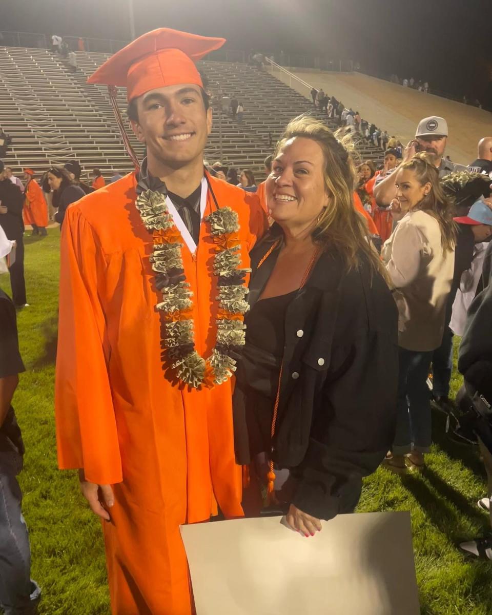 Jessica Armijo and her son, Brandon, who was one of 498 Apple Valley High School seniors who turned their tassels during a commencement ceremony at Newton T. Bass Stadium on Wednesday, May 24, 2023.