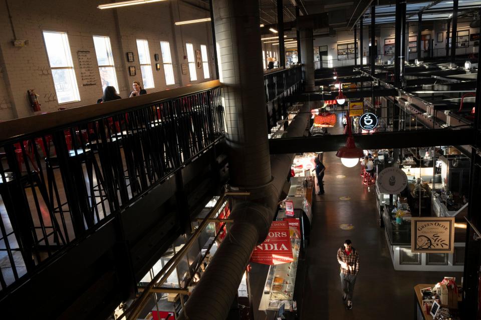 Feb 9, 2023; Columbus, Ohio, USA;  Evening sunlight filters through the west-facing windows of North Market on Thursday evening. Mandatory Credit: Joseph Scheller-The Columbus Dispatch