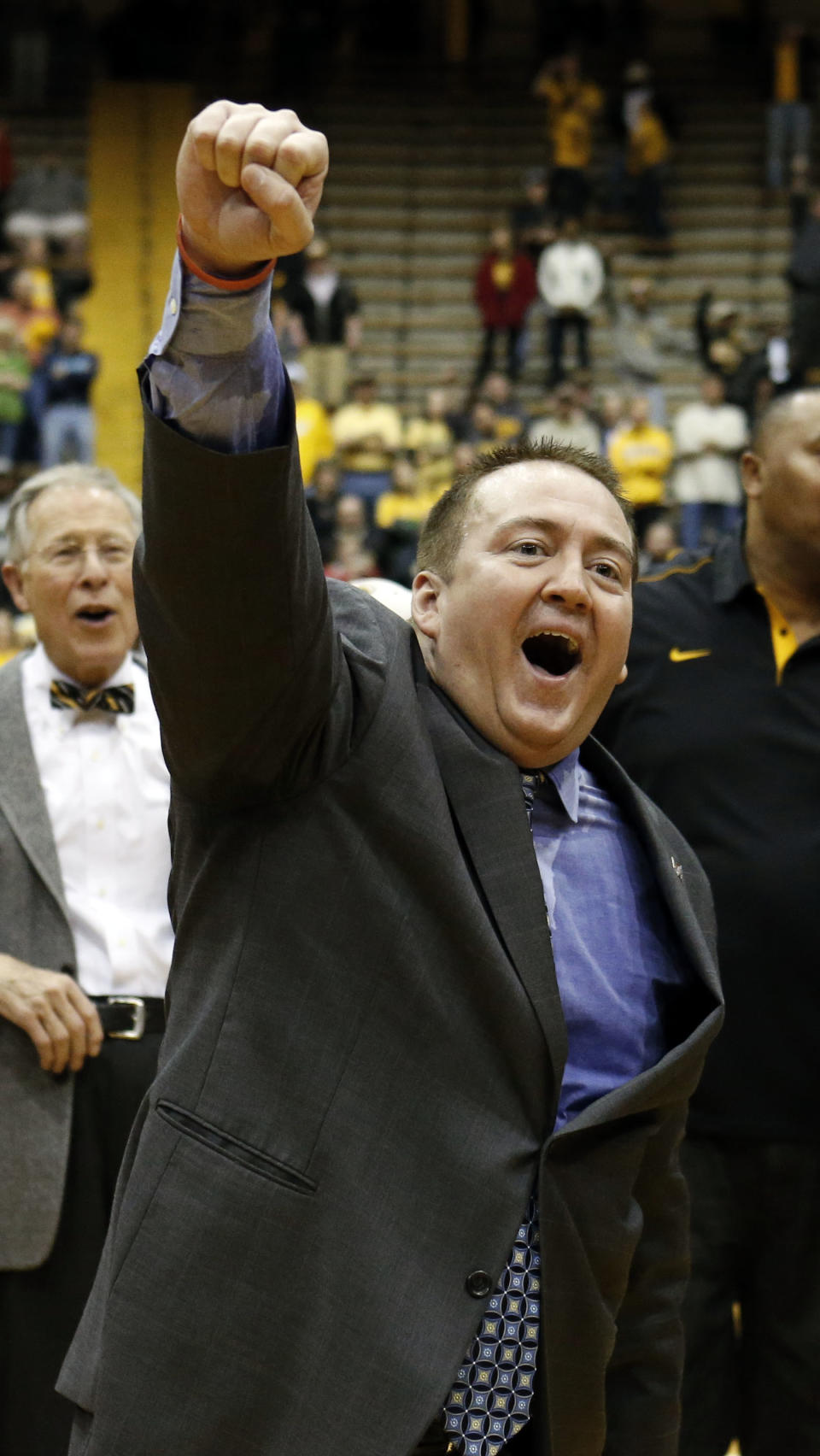 FILE - In this March 25, 2013 file photo, Southern Mississippi basketball coach Donnie Tyndall celebrates his team's 63-52 win over Louisiana Tech in their NIT college basketball game in Hattiesburg, Miss. Tennessee is counting on Tyndall to make the same successful transition from the mid-major ranks as the Volunteers' last two men's basketball coaches. Tennessee announced Tuesday morning, April 22, 2014, that Tyndall would be introduced as its new coach at a 2 p.m. news conference. (AP Photo/Rogelio V. Solis, File)