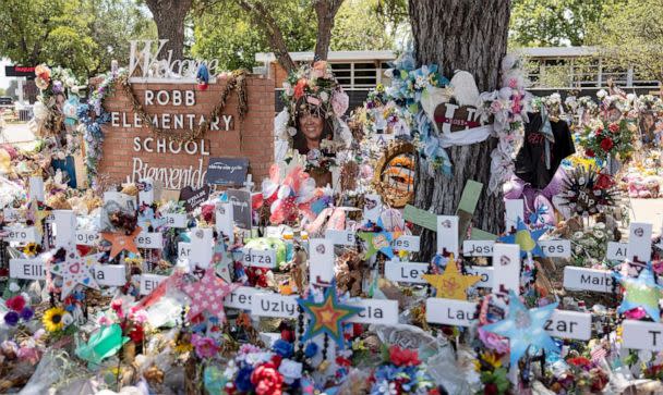PHOTO: A makeshift memorial site to victims stands outside the Robb Elementary School in Uvalde, Texas, Aug. 8, 2022. (Nick Wagner/Xinhua via Newscom)