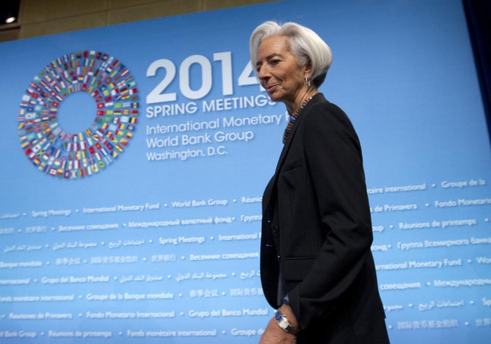 International Monetary Fund (IMF) Managing Director Christine Lagarde arrives for a news conference during the IMF/World Bank Spring Meetings at IMF headquarters in Washington, Thursday, April 10, 2014. Lagarde said the global economy is finally turning the corner after a deep recession but the recovery remains too weak. (AP Photo/Jose Luis Magana)