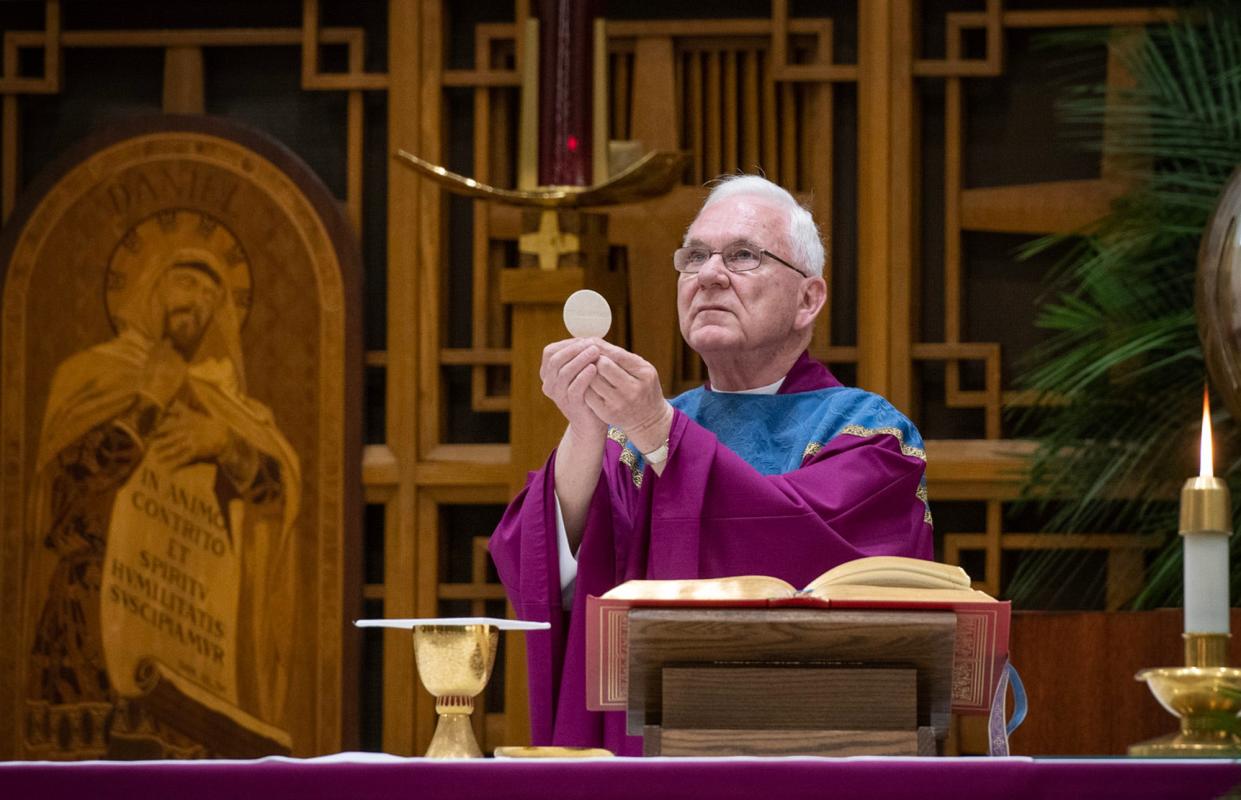 The Rev. Msgr. Thomas J. Sullivan celebrates Spy Wednesday Mass at Christ the King Church Wednesday in Worcester.