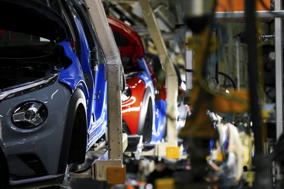 Car production takes place ahead of a visit from Britain's Prime Minister Rishi Sunak and Chancellor of the Exchequer Jeremy Hunt at the Nissan factory, in Sunderland, England, Friday, Nov. 24, 2023. Nissan will invest more than $1.3 billion to update its factory in northeast England to make electric versions of its two best-selling cars. It's a boost for the British government as it tries to revive the country’s ailing economy. The Japanese automaker manufactures the gasoline-powered Qashqai and smaller Juke crossover vehicles at the factory in Sunderland, which employs 6,000 workers. (Ian Forsyth/Pool Photo via AP)