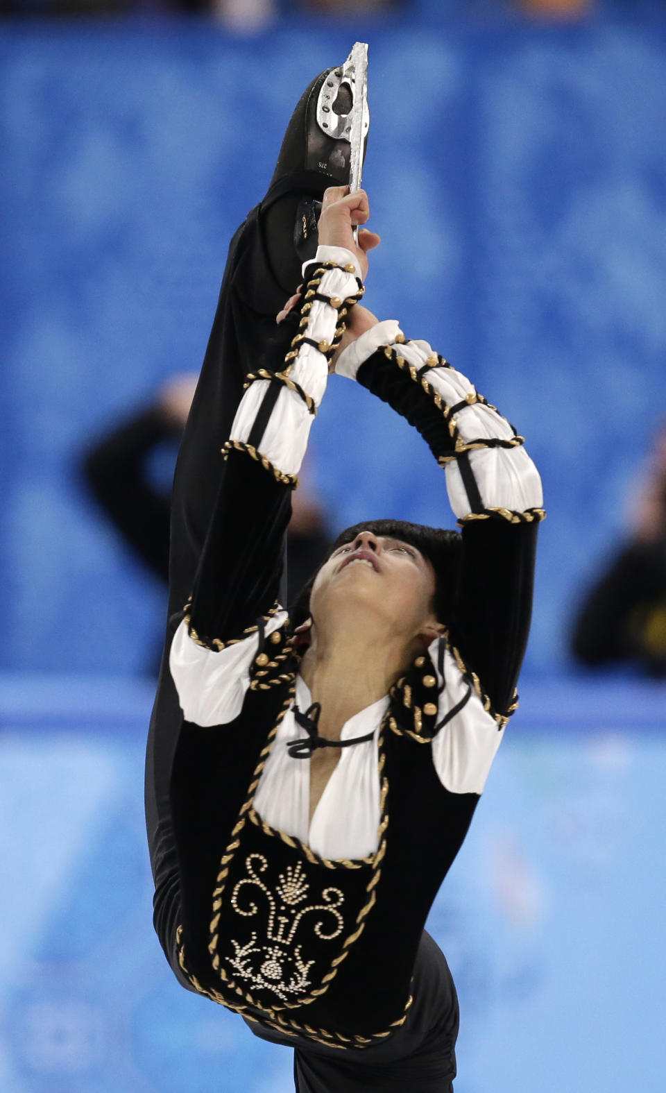 Michael Christian Martinez of the Philippines competes in the men's short program figure skating competition at the Iceberg Skating Palace during the 2014 Winter Olympics, Thursday, Feb. 13, 2014, in Sochi, Russia. (AP Photo/Bernat Armangue)