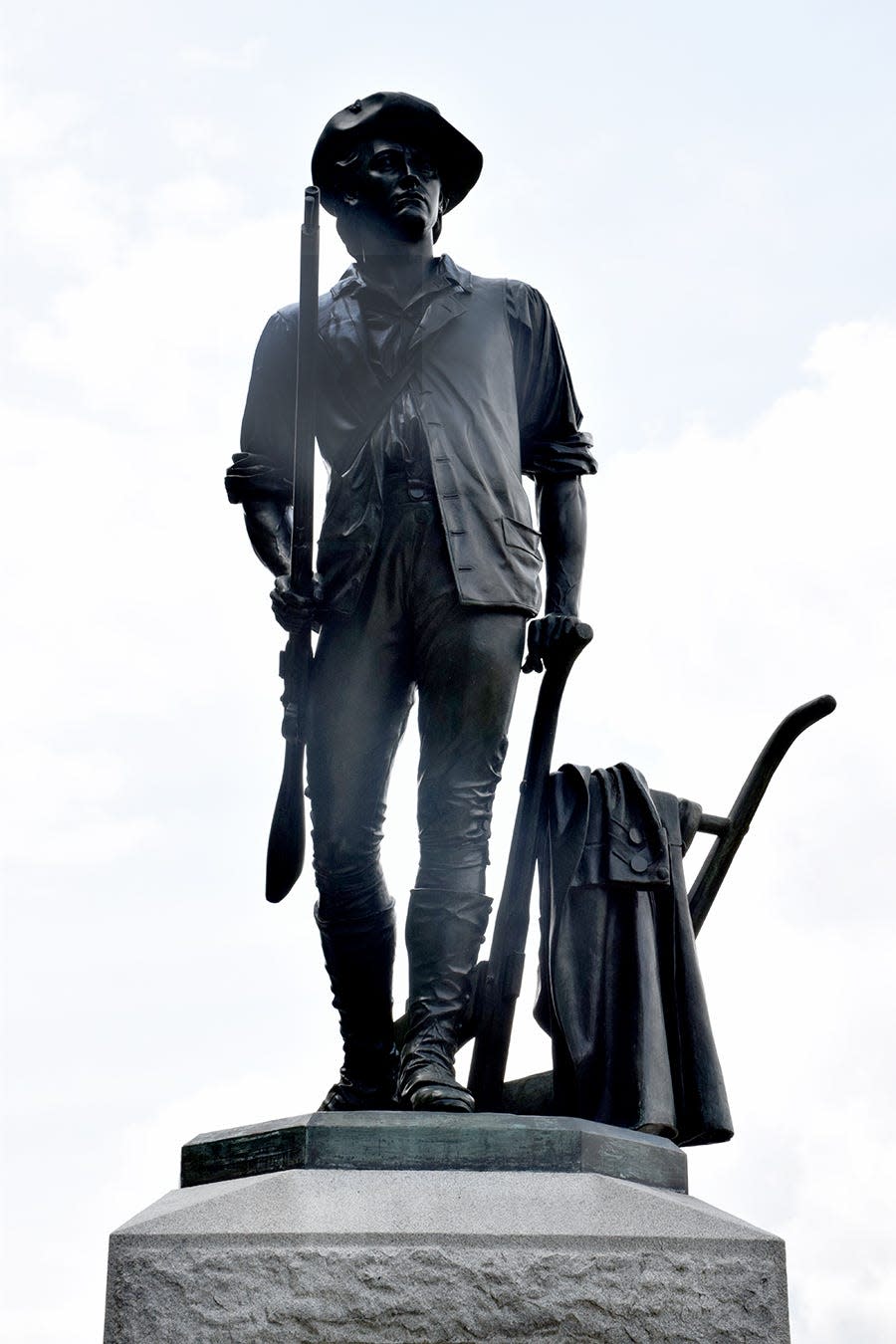 The Concord Minuteman statue stands on the west side of the North Bridge near Concord, Massachusetts, where American militiamen faced off with British redcoats on April 19, 1775.