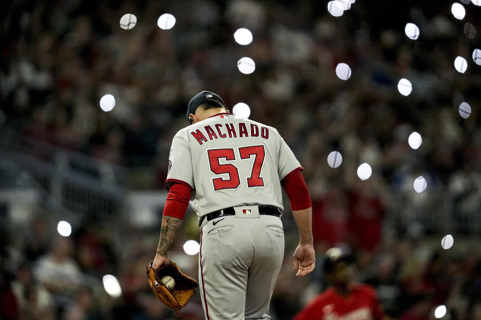 Washington Nationals relief pitcher Andres Machado (57) prepares to work on the mound agaimst the Atlanta Braves during fourth inning of an baseball game, Friday, Sept. 29, 2023, in Atlanta. (AP Photo/Mike Stewart)