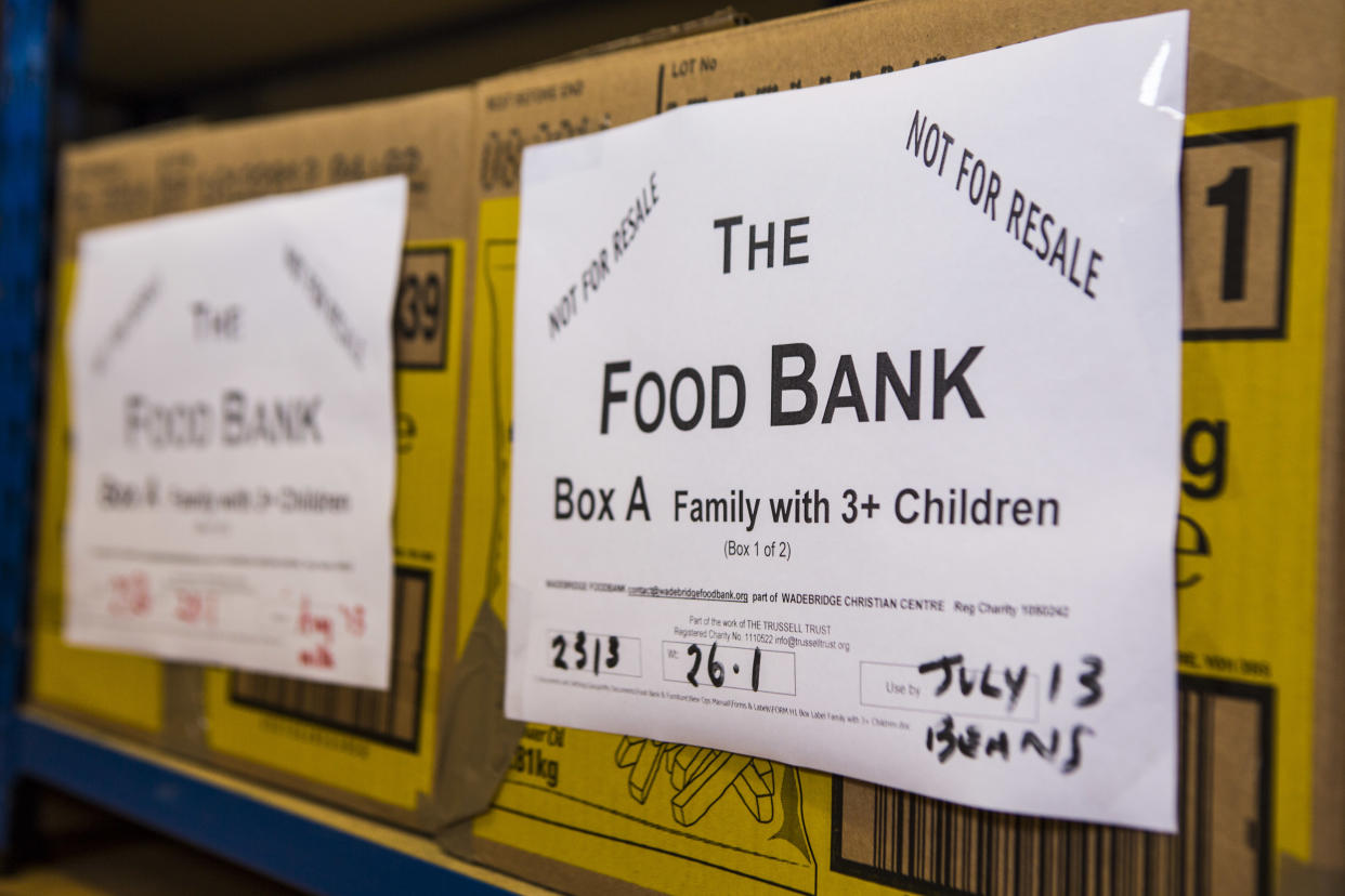 Trussell Trust Food Bank box for a family with three children waiting for distribution in the Wadebridge foodbank, North Cornwall, England, United Kingdom. The box has been prepared by volunteers and contains non-perishable food items. (Photo by In Pictures Ltd./Corbis via Getty Images)