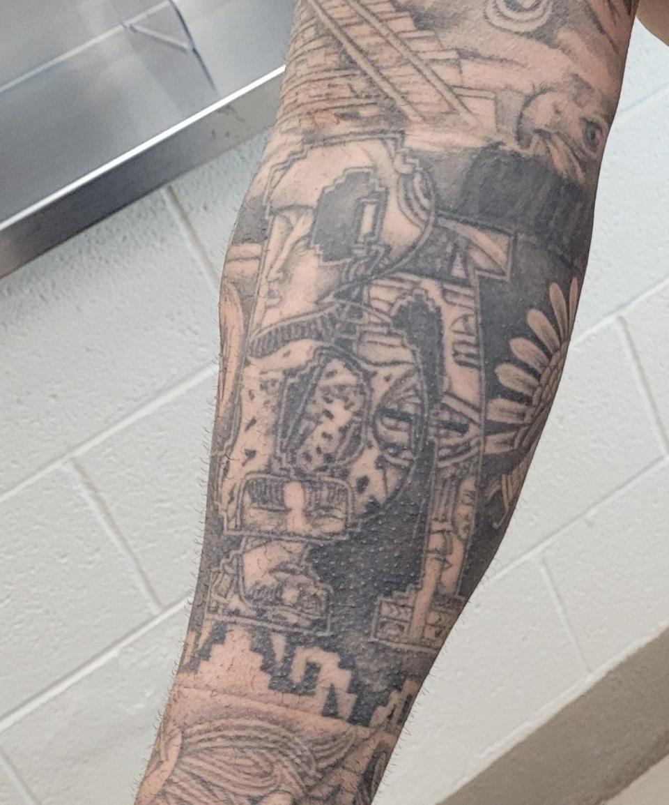 A "BA" signifying the Barrio Azteca gang is among Aztec imagery in an arm tattoo of an admitted gang member arrested by U.S. Border Patrol and the El Paso County Sheriff's Office in El Paso County in February 2024.