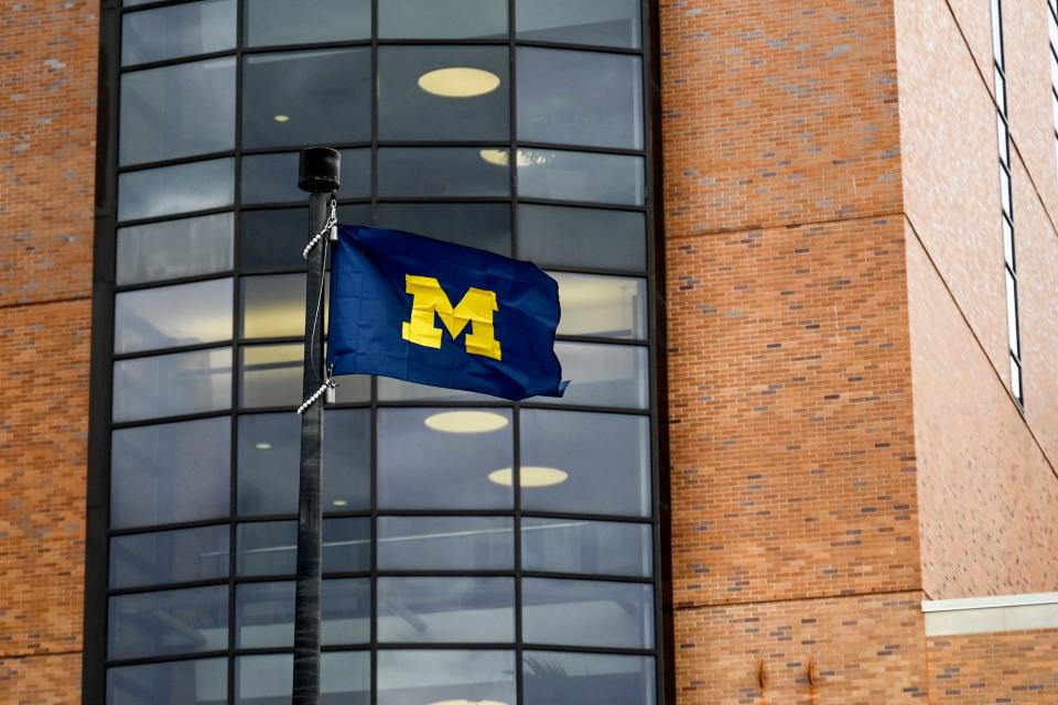 A University of Michigan flag flies outside Sparrow Hospital on Monday, April 3, 2023, in Lansing.