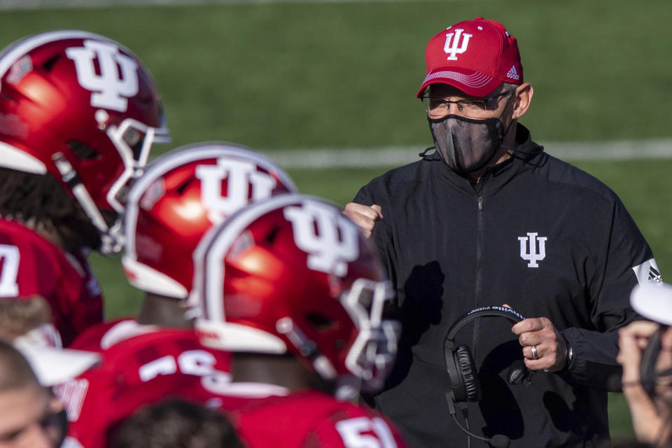 FILE - In this Saturday, Nov. 7, 2020, file photo, Indiana head coach Tom Allen looks toward his players on the sideline during a break in the second half of an NCAA college football game against Michigan in Bloomington, Ind. Allen is coach of the year on the Associated Press All-Big Ten football team. (AP Photo/Doug McSchooler, File)