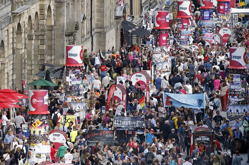 Crowds mingle on Edinburgh's Royal Mile during the 2016 Edinburgh Fringe Festival