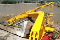 A view of a destroyed bridge following an earthquake and tsunami in Palu, Central Sulawesi. Antara Foto/Muhammad Adimaja/ via REUTERS