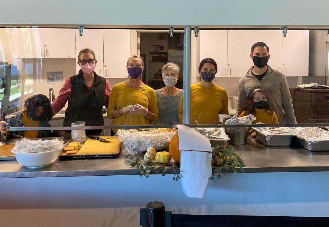 Volunteers for the People’s Kitchen of San Luis Obispo prepare to welcome clients to their 2021 Thanksgiving meal at 40 Prado Homeless Shelter. The organization has been providing free lunches for nearly four decades.