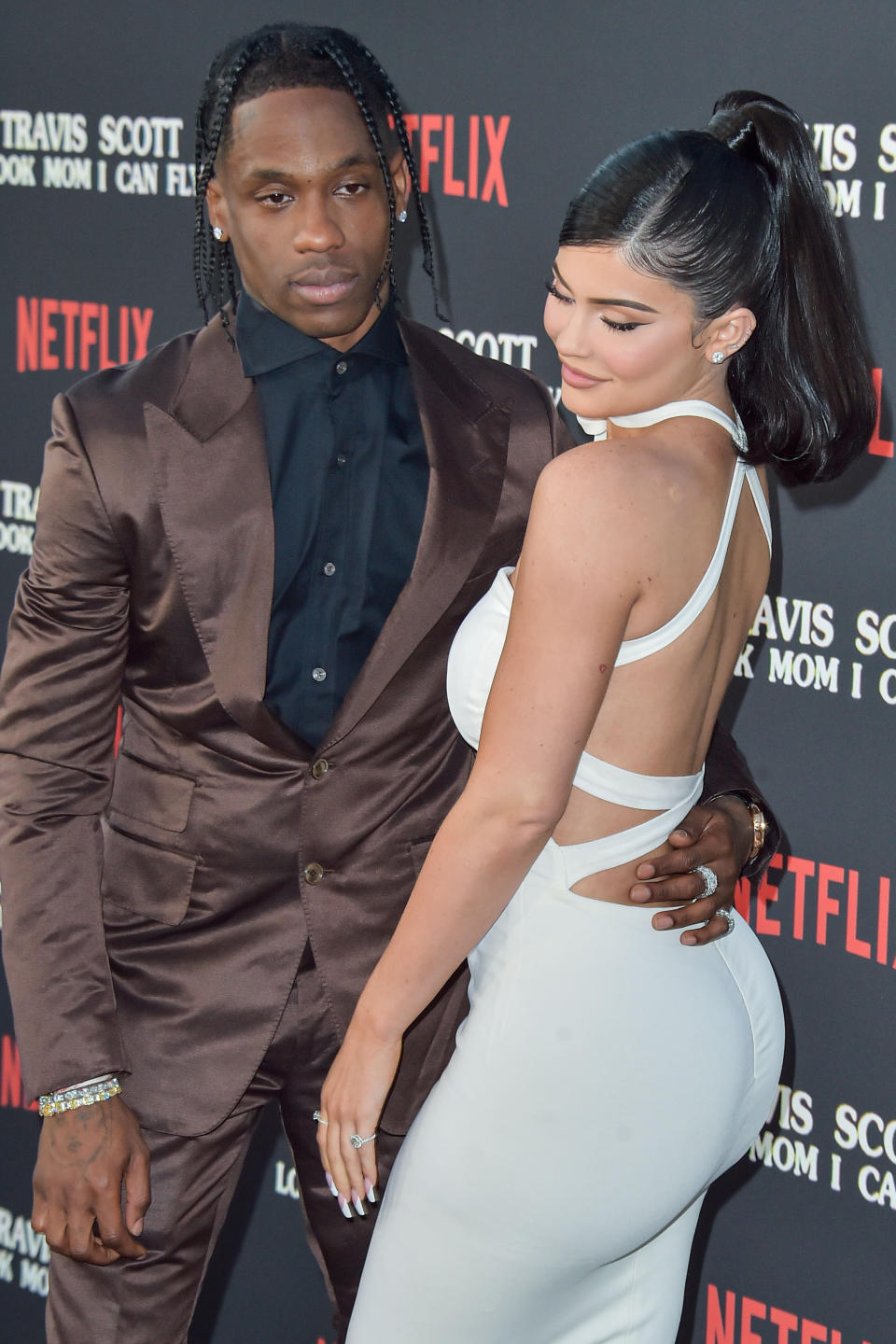 SANTA MONICA, LOS ANGELES, CALIFORNIA, USA - AUGUST 27: Rapper Travis Scott and girlfriend/television personality Kylie Jenner arrive at the Los Angeles Premiere Of Netflix's 'Travis Scott: Look Mom I Can Fly' held at Barker Hangar on August 27, 2019 in Santa Monica, Los Angeles, California, United States. (Photo by Image Press Agency/Sipa USA)