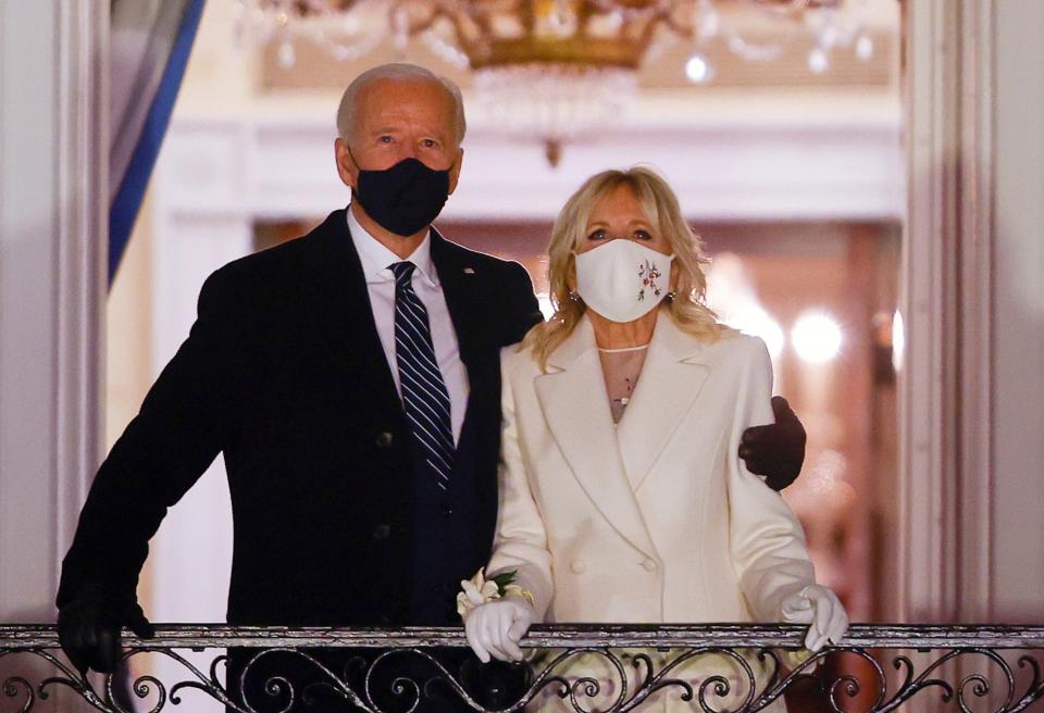 <p>US President Joe Biden and first lady Jill Biden watch fireworks from the White House after his inauguration as the 46th President of the country</p> (Reuters)