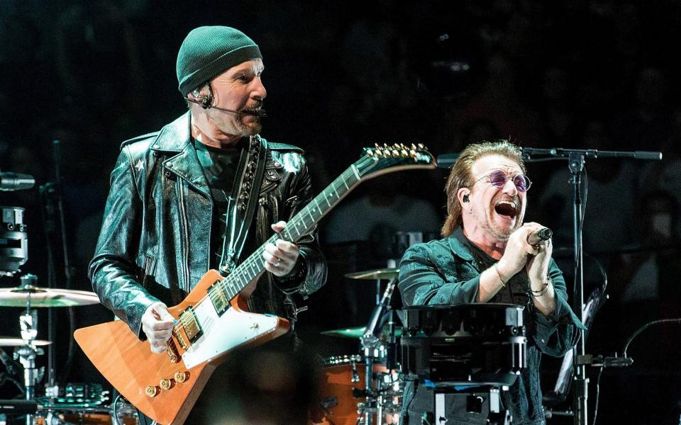 Bono and The Edge on stage in 2018 - Getty