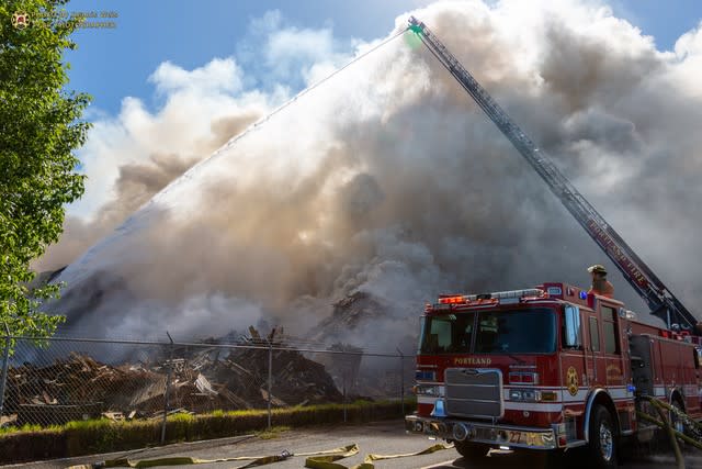 Portland Fire tackles large sawdust, pallet fire at wood recycling plant