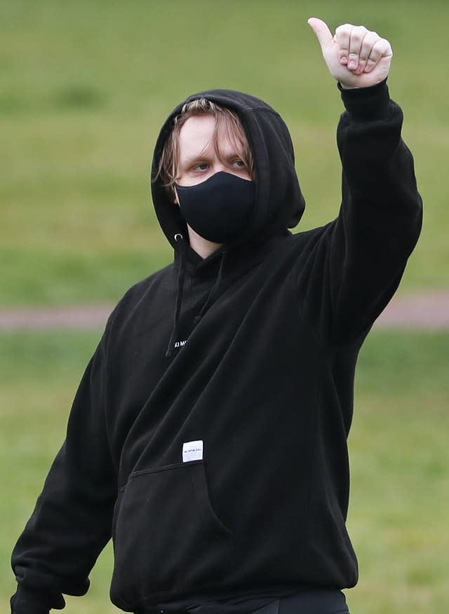 Singer Lewis Capaldi joined a protest rally in Holyrood Park, Edinburgh