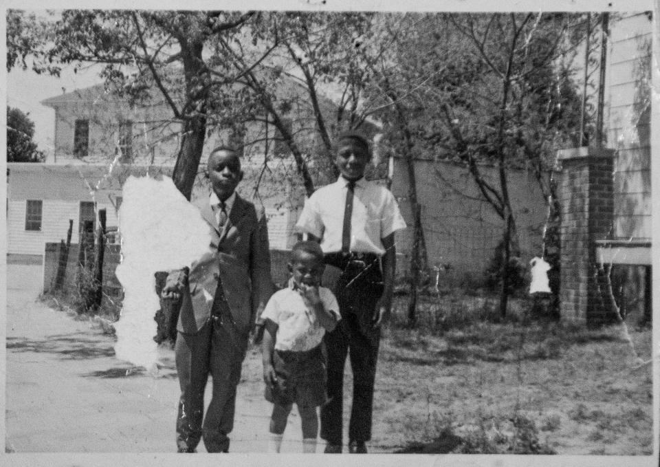 Desmond Wilson, director of community development for the City of Montgomery, shown as a child, front center, growing up on Grady Street Montgomery.