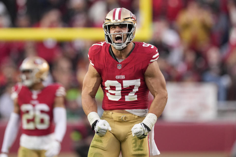 San Francisco 49ers defensive end Nick Bosa (97) celebrates after sacking Seattle Seahawks quarterback Drew Lock during the second half of an NFL football game in Santa Clara, Calif., Sunday, Dec. 10, 2023. (AP Photo/Godofredo A. Vásquez)