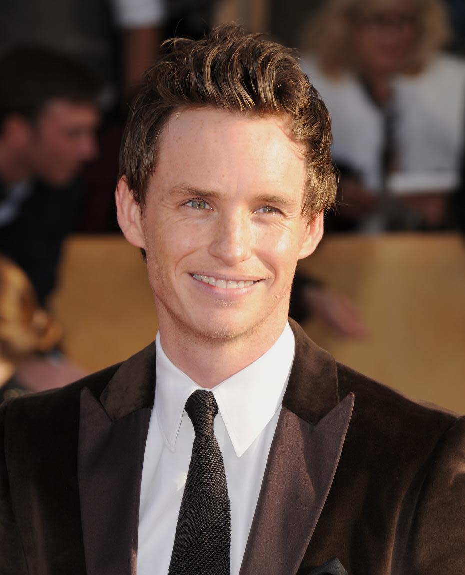 Actor Eddie Redmayne arrives at the 19th Annual Screen Actors Guild Awards at the Shrine Auditorium in Los Angeles on Sunday, Jan. 27, 2013. (Photo by Jordan Strauss/Invision/AP)