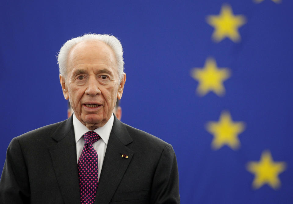 Israel's President Shimon Peres addresses the European Parliament in Strasbourg, in this March 12, 2013 file photo. REUTERS/Jean-Marc Loos/Files