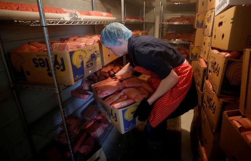 FILE PHOTO: Butcher Allan vande Bruinhorst freezes beef in Picture Butte